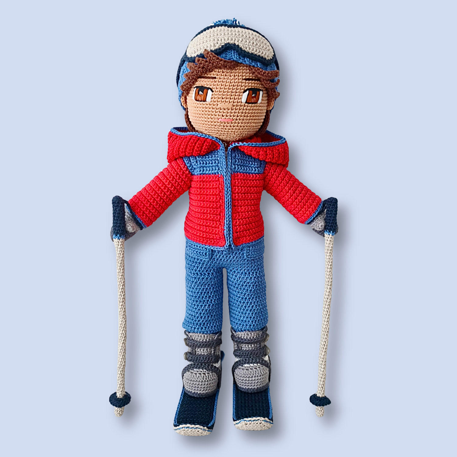Thomas Skier crochet ski outfit pattern shown on the finished doll