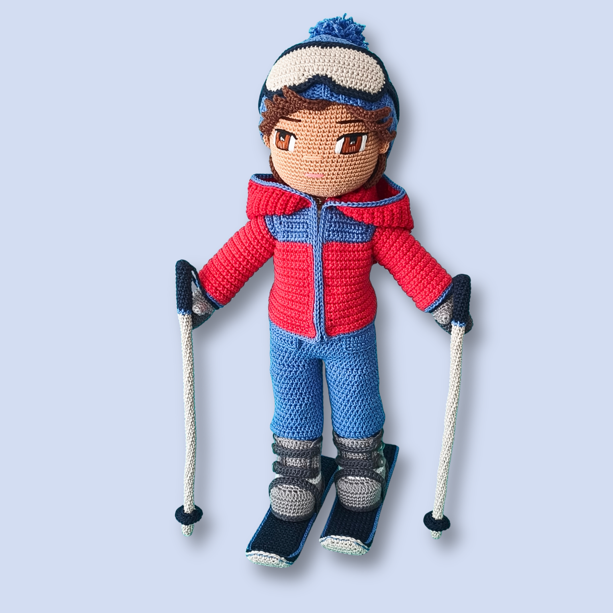 Thomas Skier crochet doll pattern, standing on crochet skis