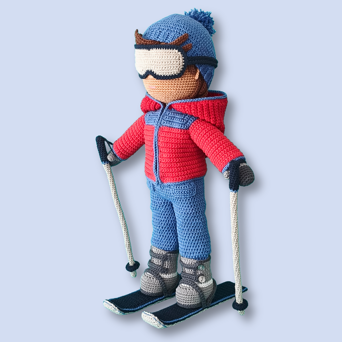 Thomas Skier crochet doll pattern, front view with hat and snow goggles