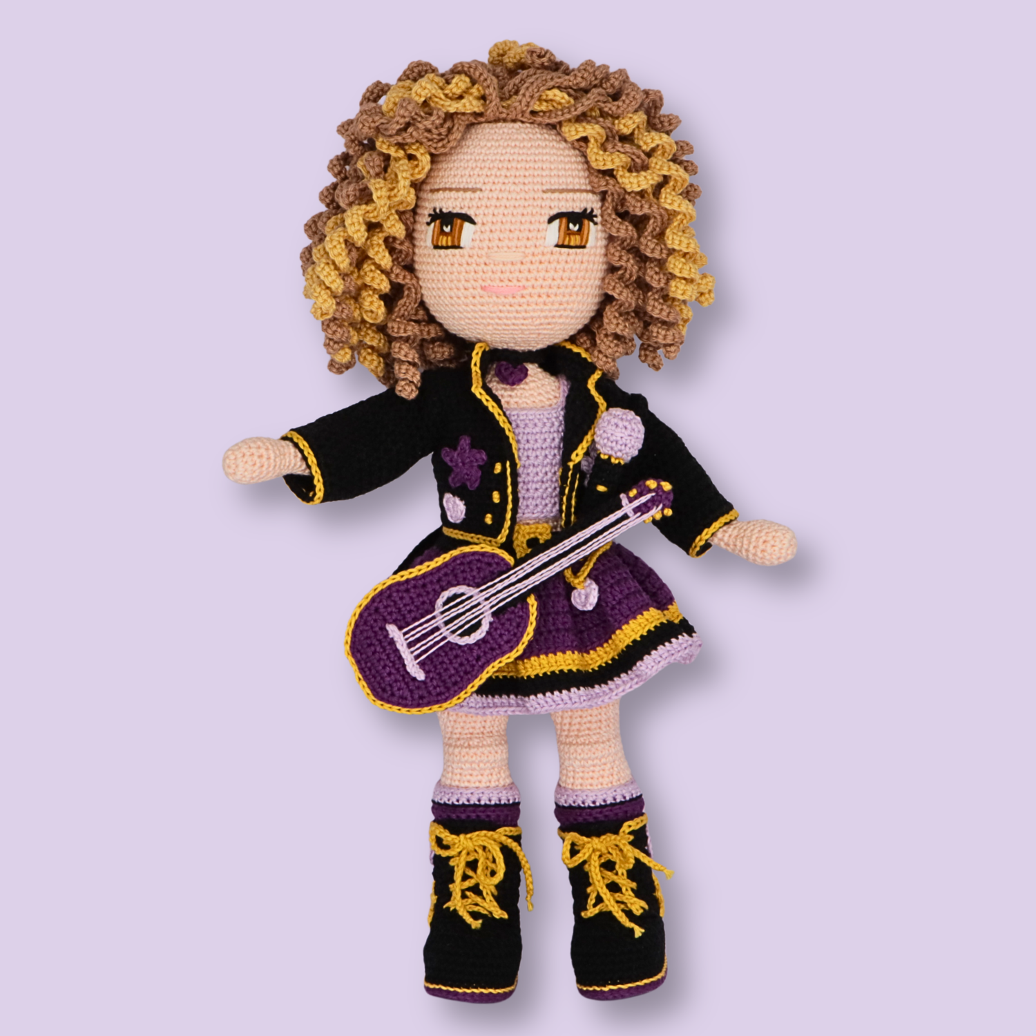 Alice crochet doll pattern - full front view of finished amigurumi doll with guitar and boots
