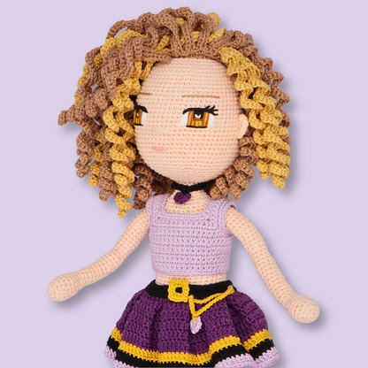 Close-up of Alice amigurumi doll in lilac top and purple belted skirt - crochet doll pattern