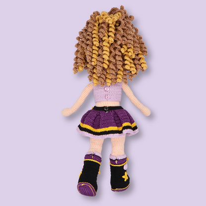 Back view of Alice amigurumi doll showing buttoned top and skirt details - crochet doll pattern