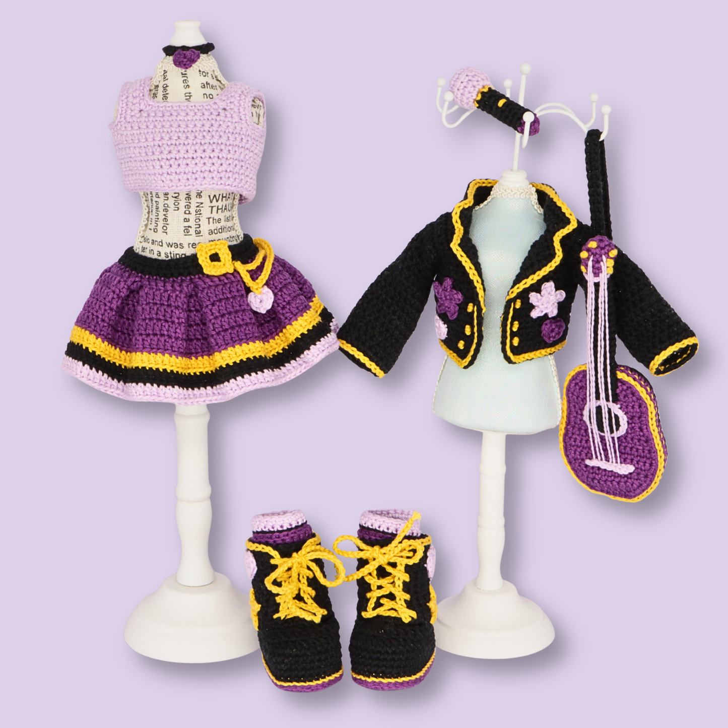 Removable crochet outfit for Alice doll: lilac top, purple skirt, black jacket, boots, and guitar