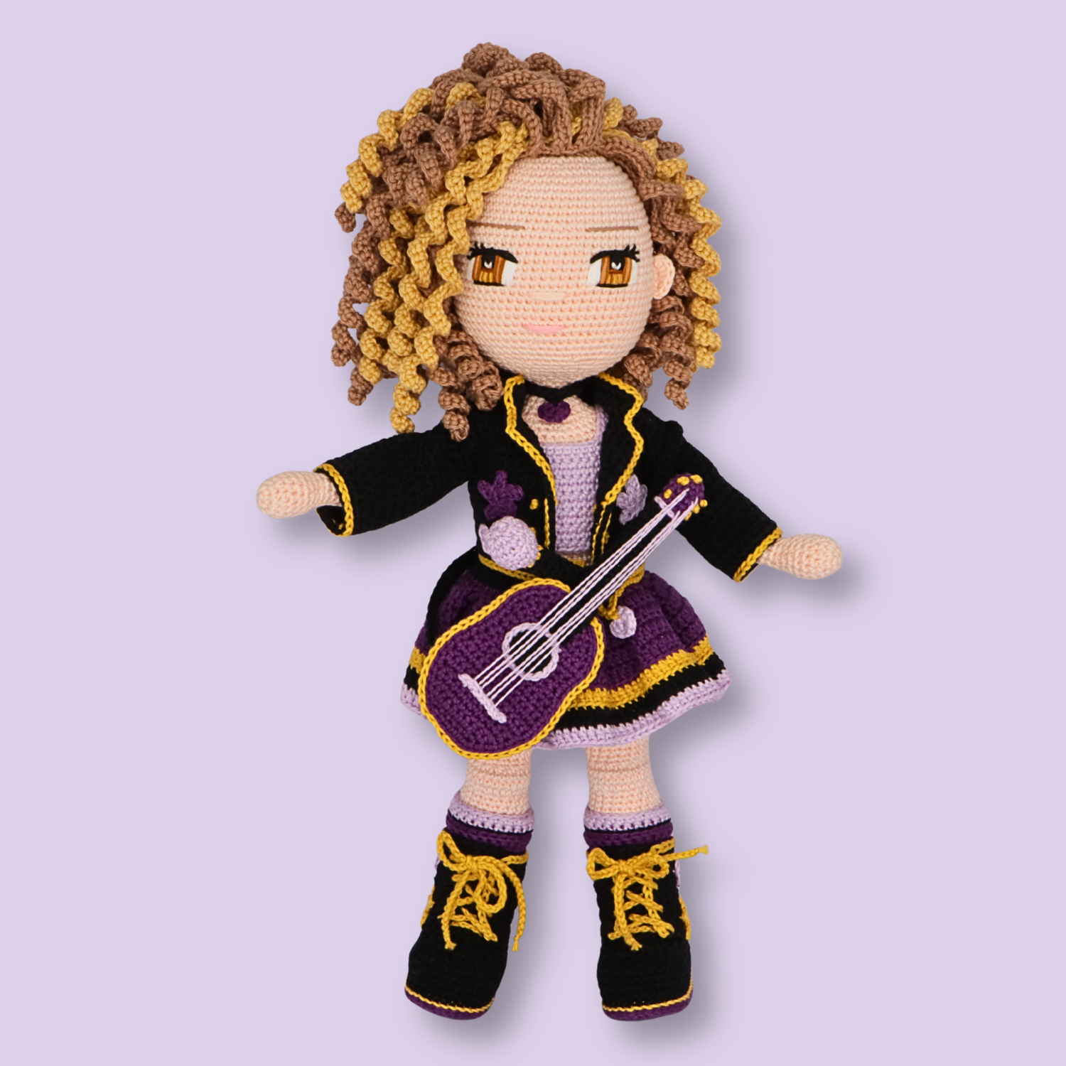 Alice amigurumi doll in lilac top, purple skirt, and black jacket holding a crochet guitar - PDF doll pattern