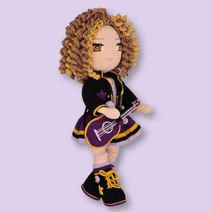 Side view of Alice crochet doll with guitar and black lace-up boots - amigurumi doll pattern