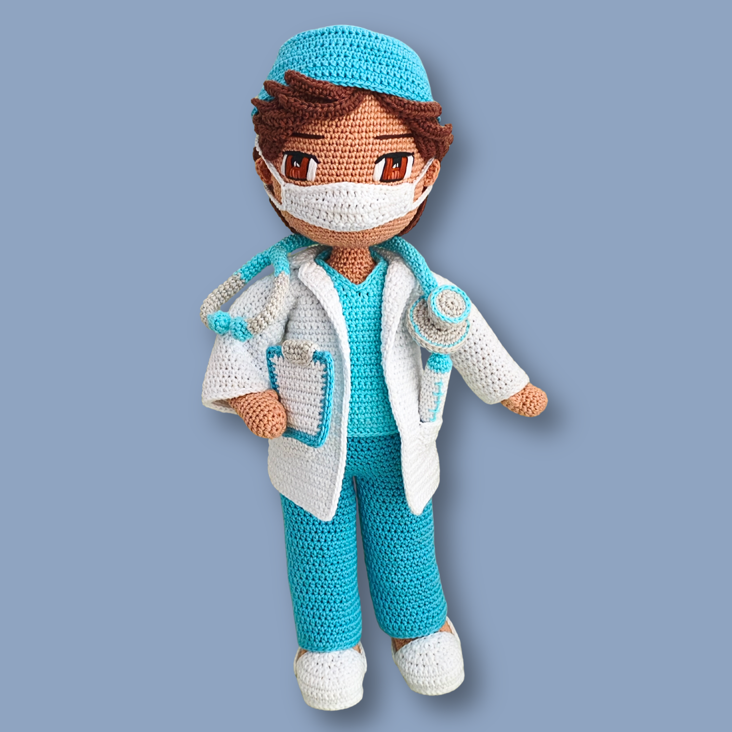 Dr. Thomas crochet doll pattern PDF - doll with white face mask, blue scrub cap, and stethoscope around neck