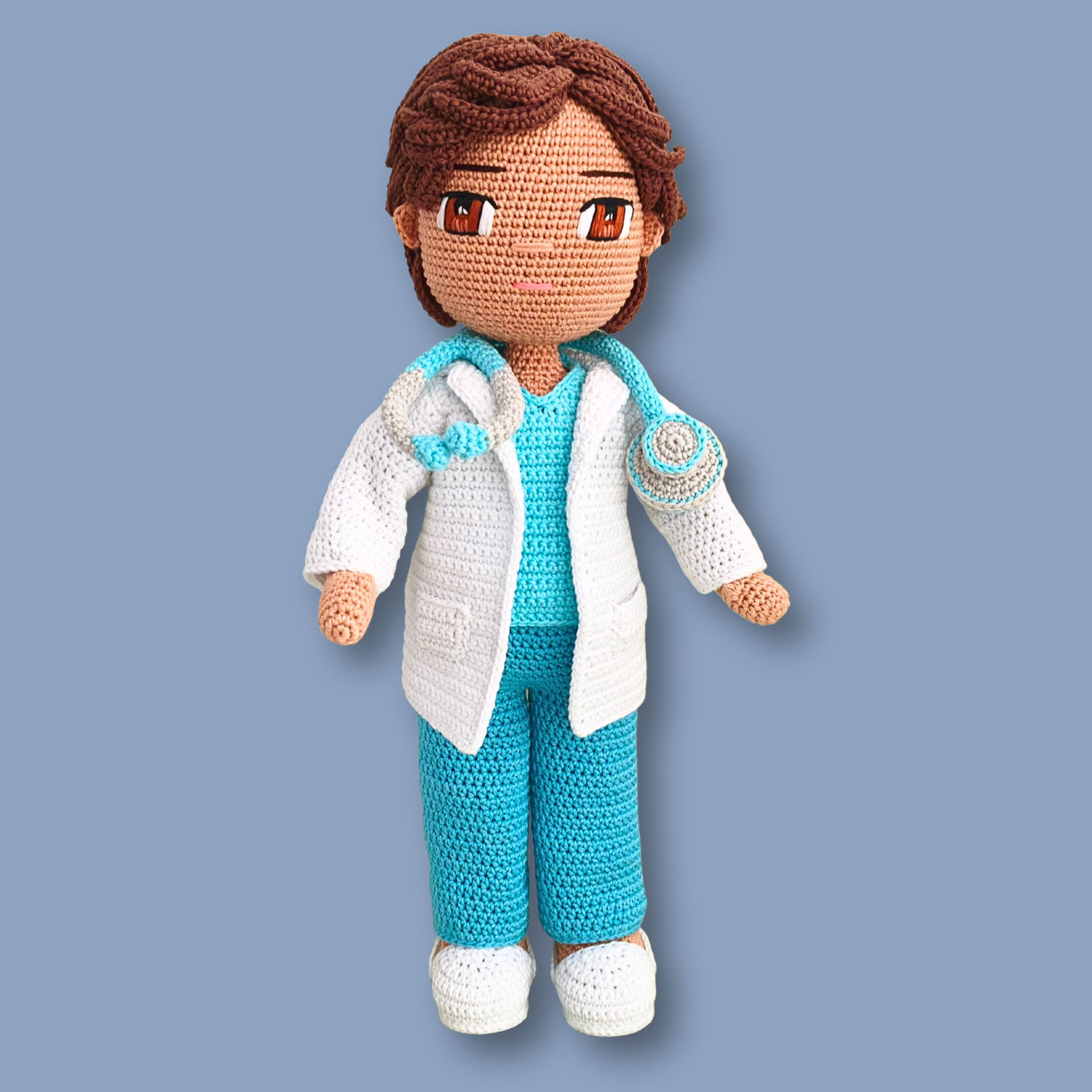 Dr. Thomas doctor crochet doll by Crochetree with stethoscope around neck and pockets on the white lab coat