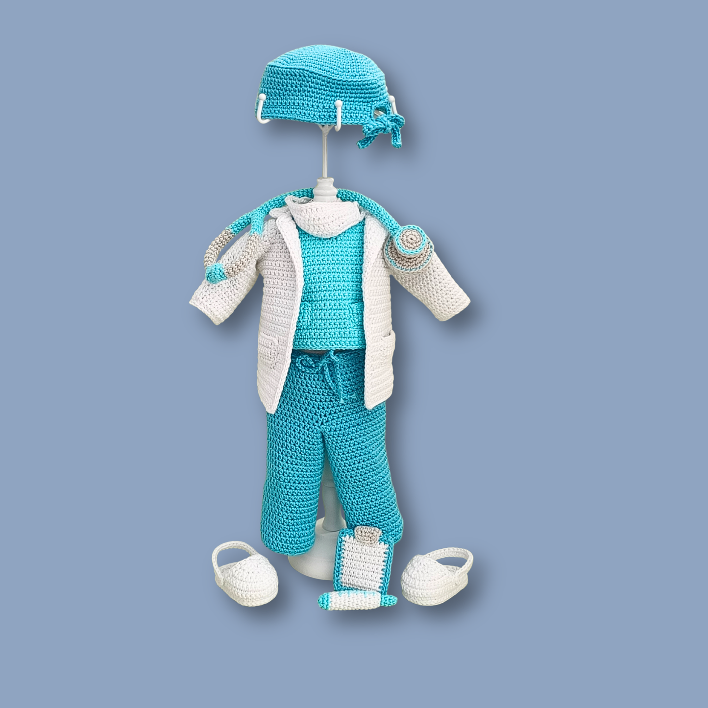 Complete removable doctor outfit for Dr. Thomas crochet doll: cap, lab coat, scrub set, shoes, and clipboard