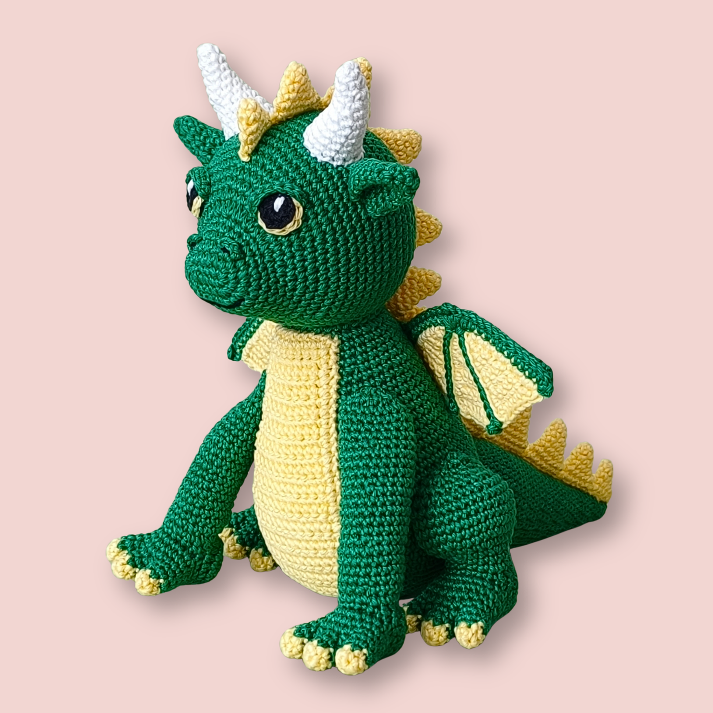 Magnus the Dragon crochet pattern - front view of finished amigurumi